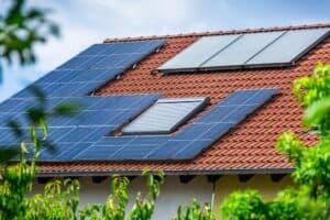 Solar panels integrated with a cool roofing system