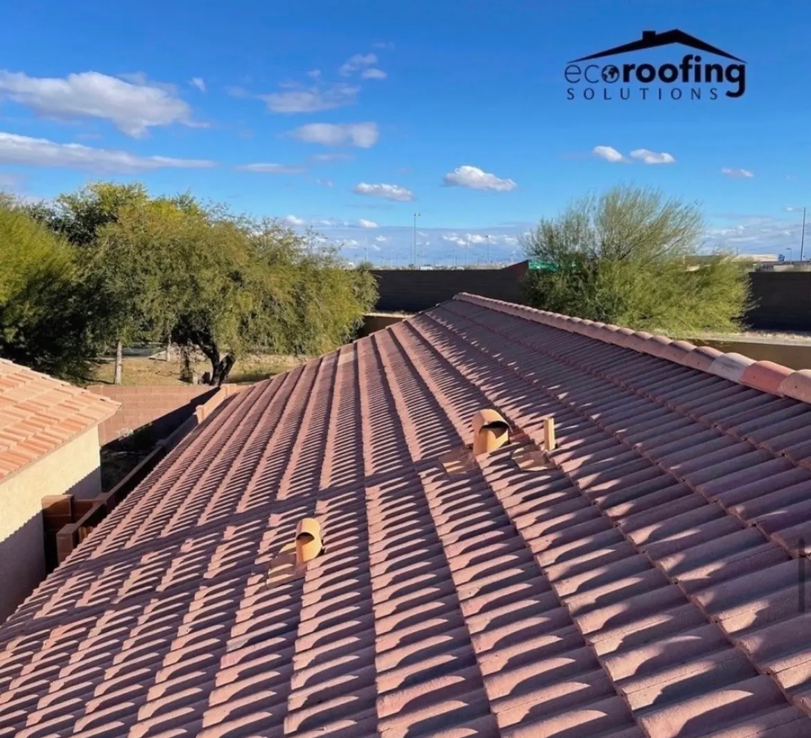 Finished concrete tile roof on an Arizona home photographed from the ridge