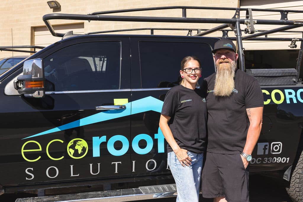 Eric Perry, Owner and President, with Cierra Perry, Vice President, in front of a branded Eco Roofing Solutions truck